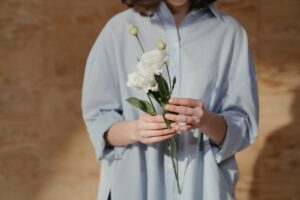 woman holding flower